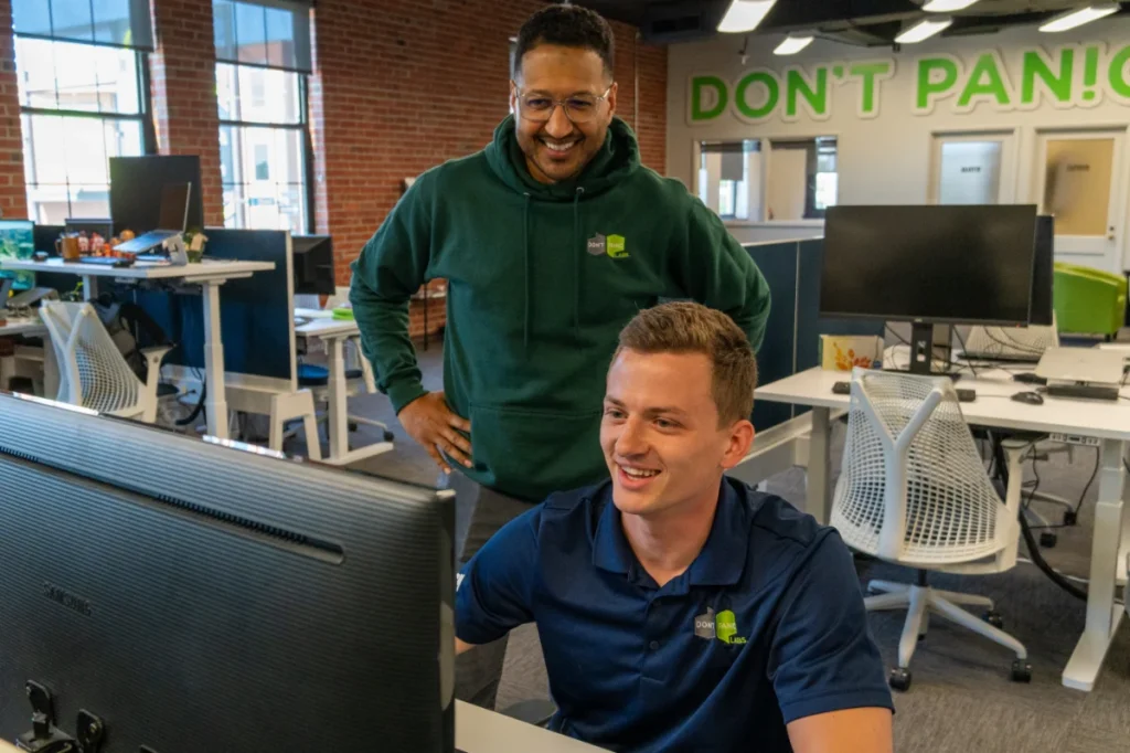 Michael and Gage collaborating at Don't Panic Labs